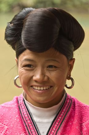 Their ritual for tourists is to unravel their very long hair, then comb through it. We enjoyed chatting with them.