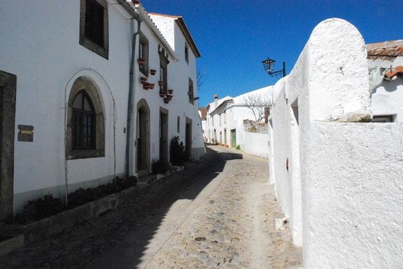 A typical Marvão whitewashed street leading to the castle