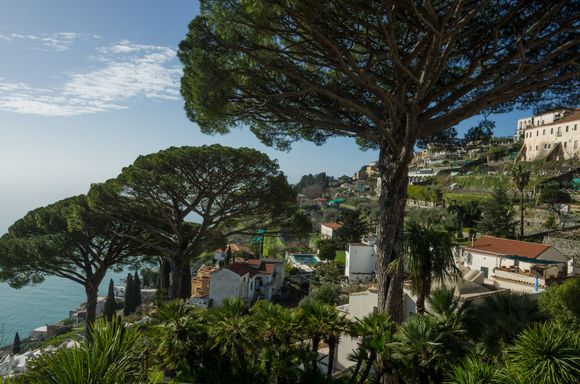 Villa Rufolo is the setting of a summer classical/opera festival. Travelers can almost have the place to themselves if they arrive as we did, right for opening time. Tropical terraced gardens cascade down the steep property, with pergolas framing fine views of the precipitous coastline. Fountains, towers, belvederes and romantic nooks round out the scene. Off-season, one needs to be prepared for a pared-down appearance, devoid of many floral beds. But the incredible panoramas are year-round.