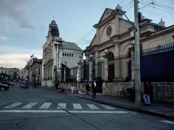 The facade of the Holy Spirit cathedral, from the south side of the plaza.  Due mainly to earthquakes, the cathedral was damaged and reconstructed several times, until finally, at the end of the 19th century, they just gave up and started building the new one, which was slipped in behind the facade .