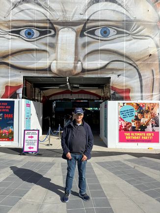 Ed in front of the creepy clown entrance to Luna Park
