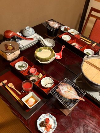Breakfast: tomato juice, small whole river fish we grilled ourselves, soup with noodles and vegetables, miso soup, sticky rice with miso, pickles, fresh soft tofu, egg cooked in hot spring water, cantaloupe. 