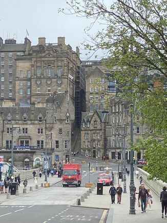 Walking across Waverley Bridge to Old Town. We love the architecture and ambiance.