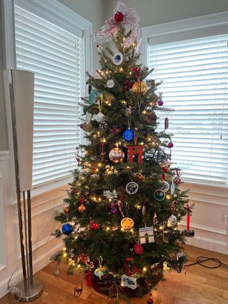 xmas tree 2025, with ornaments collected from our travels