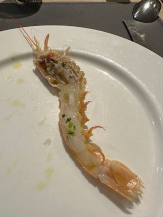 This is one of the scampi.....barely cooked and delicious...I asked if they were gamberoni and he admonished me:  No, no gamberoni!!!   Scampi!!)