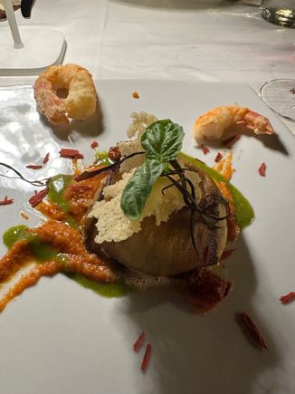 Appetizer of stupendous eggplant parmesan..so light.  (18 euro)