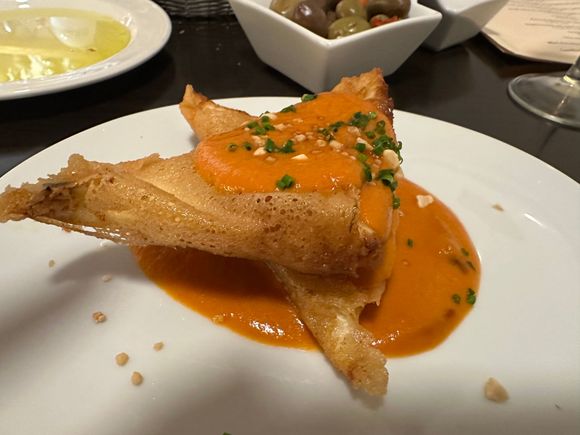 Brik pastry filled with creamy white cheese and hefty chunks of prawns