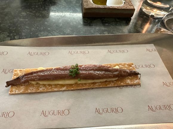 I was feeling so poorly that I managed only one pic of the food; this is their acclaimed anchovy with blue cheese butter.    I followed by grilled hearts of lettuce with cheese.....