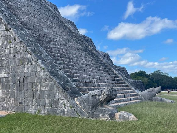 At the solstice, the light moves down the steps as the sun rises and it's supposed to look like a snake slithering down the pyramid ending in these two heads
