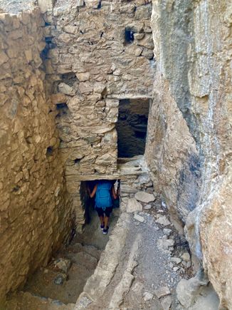 Old Philosophou Monastery is almost invisible from across the gorge as it blends into the rocks so perfectly