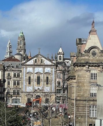 After the cathedral, we walked toward the train station, Sao Bento - noted for the tile work in the front lobby. What was cropped from this photo is some of the massive amount of construction in central Porto in conjunction with building a new metro line (you can see a large backhoe).  