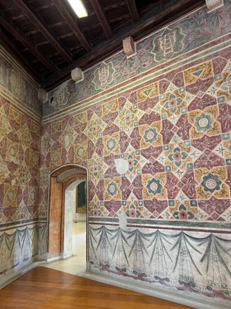 I love these walls painted with colorful geometric designs