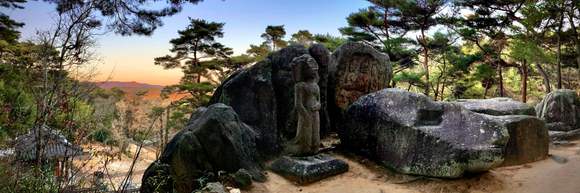 Mount Namsan (Eastern side), Gyeongju: The spectacular southern face of the 7th century Rock-carved Buddhas in Tapgok Valley.