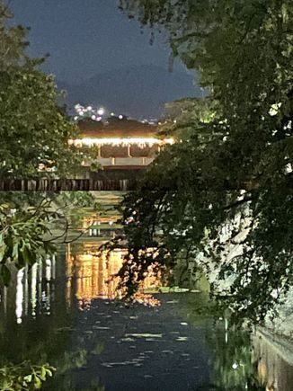 This is a great shot, I saw that because the canal is not the most lovely looking waterway, but I caught it lit up and reflected.  I like it