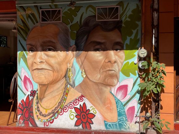There are a number of murals of abuelas (grandmas) on Adelita street.  These two senoras are most likely actually women who lived here, historical or not.  The shade has cost a line across their fore heads.