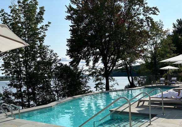 The pool looks right over this serene lake. 