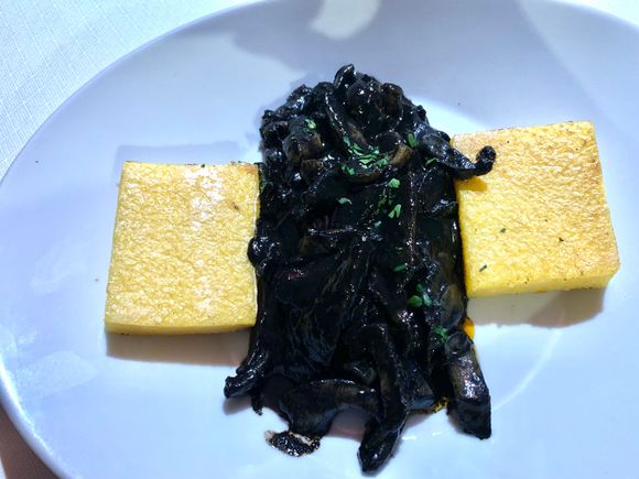 Cuttlefish in a black sauce with polenta for dinner 