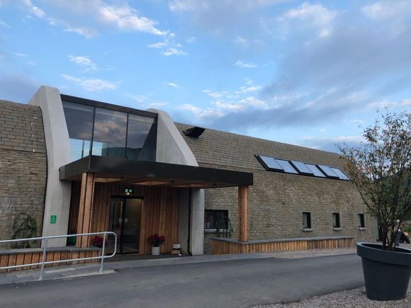 The restaurant is in this building along with some lovely lounges and the bar. The main parking lot is below the restaurant. 
