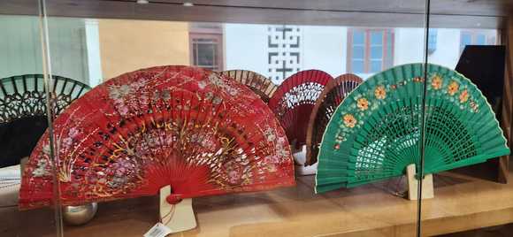 Fans. The most popular souvenir with 86 degree temps.