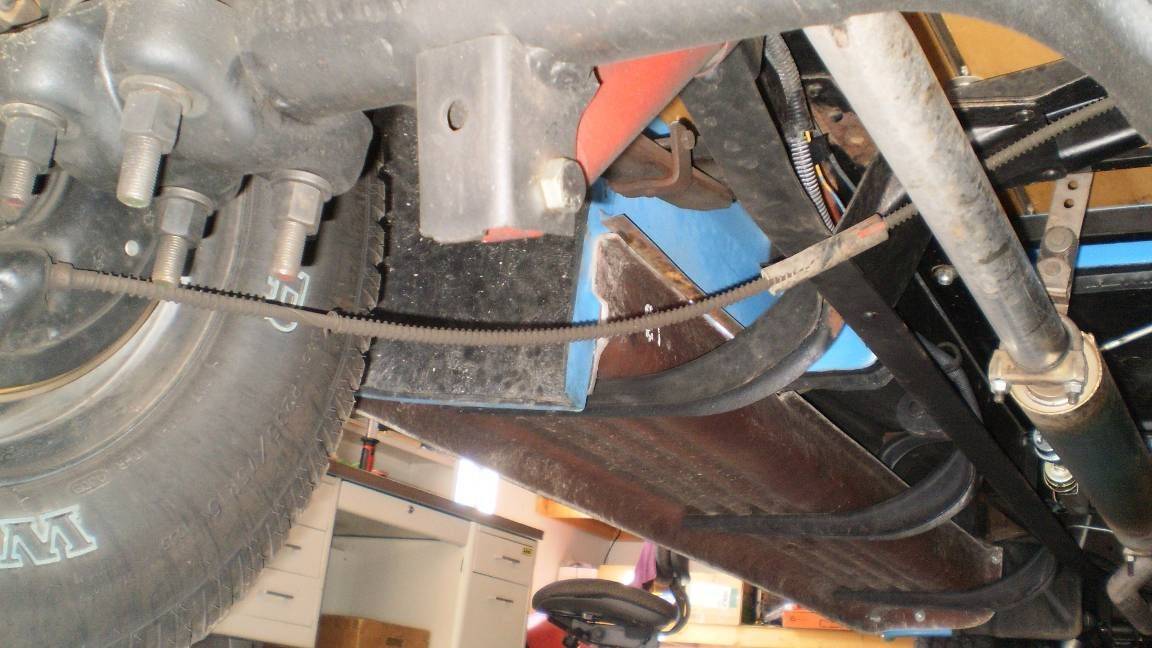 correct routing of ebrake cable from drum to bracket?? Ford Truck