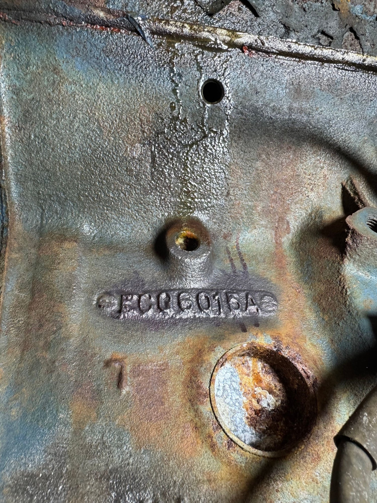 Main block stamp on the passenger side under head