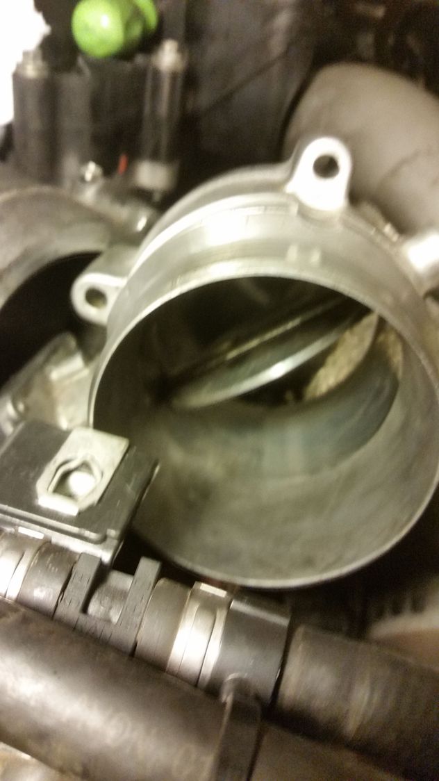 Check out this dirty throttle body, what yours may look like Ford
