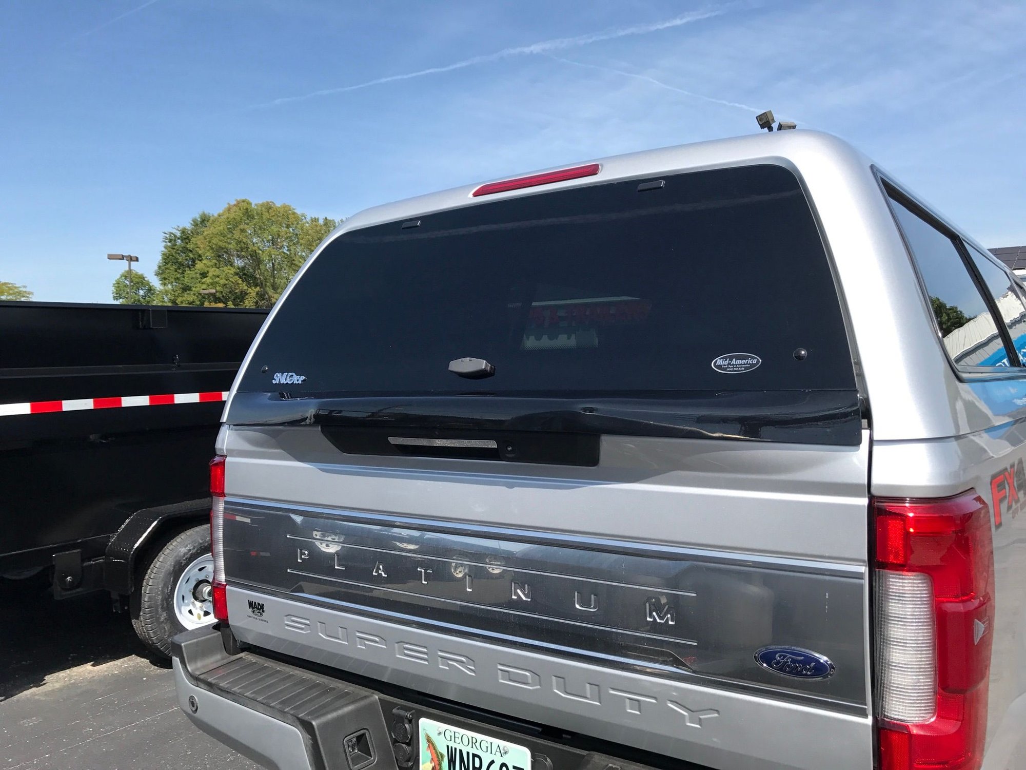 Truck cap for 2020 F350 SnugTop Rebel vs. Leer 100XR Ford Truck