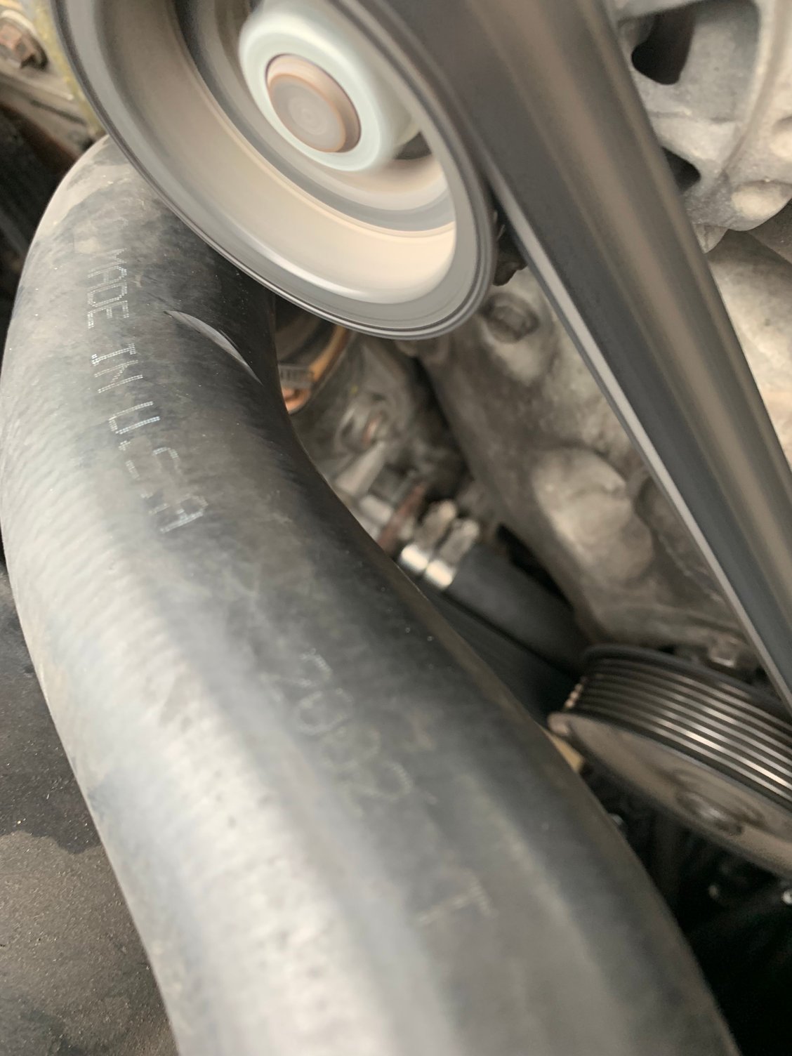 Upper radiator hose collapsed rubbing on alternator pulley Ford Truck