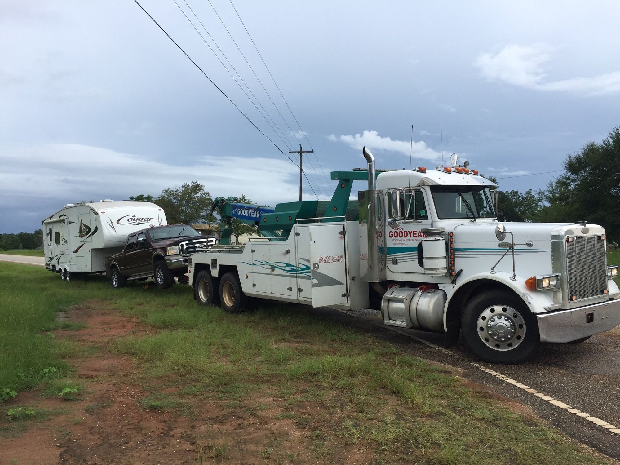 should I disconnect the drive shaft before towing Ford Truck