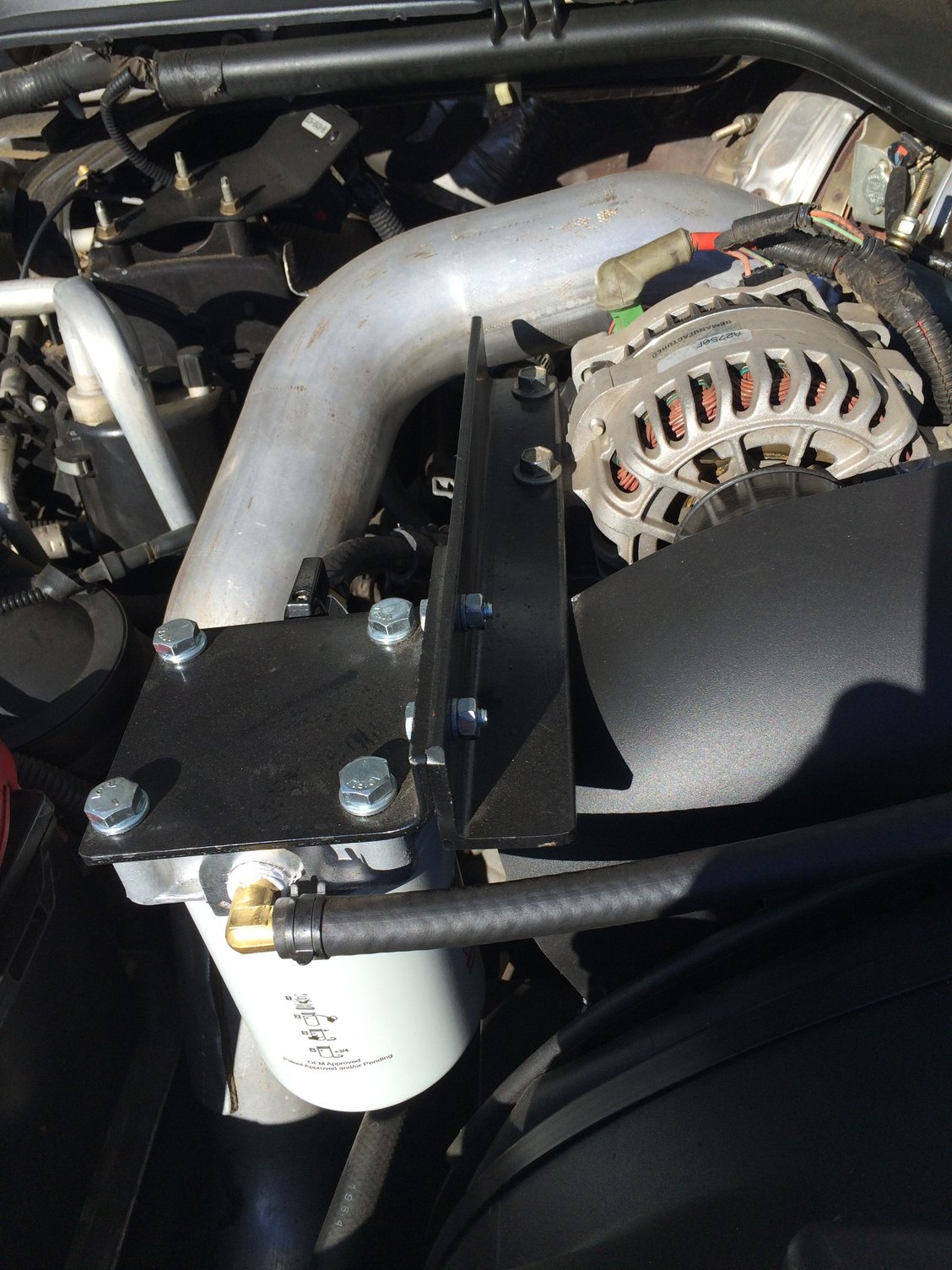 Time to figure out A new mount for coolant filter Ford Truck