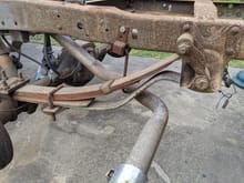 Once I got the bed off, I noticed this extra helper leaf on the rear springs.  I don't see this shown on the diagram for the rear suspension.  Is it factory?  The PO was into harness racing, so he did a little towing/hauling.  He may have added this.