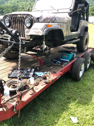 Put her on trailer to swap shaft.  Locking hub bolts were frozen and stripped out 3 of the the t15 torx bolts. Drilled them out and stole one from the other side.