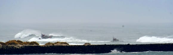 It is always interesting to watch the USCG Train in the surf.  