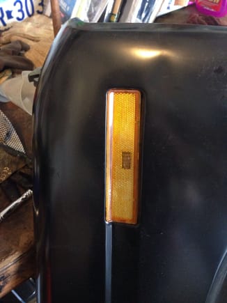 Marker light mounted in the new fender