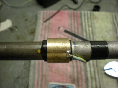new design; a modified bronze flange bearing with insulator