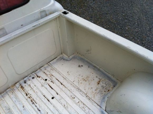 Passengers side bed front cover