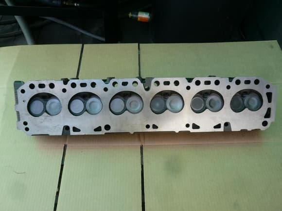 this is the best example of my cylinder head i could find. as you can clearly see that this head matches with the pic of the first block, which i don't have. by looking at these pics, i think i solved the problem with the gaskets not matching with both parts. so this head and the second block is a very close example of what i have, if not exactly.