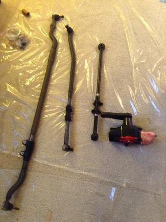 Red Head steering box, Moog tie rods and pitman arn, Fabtech adjustable track bar.