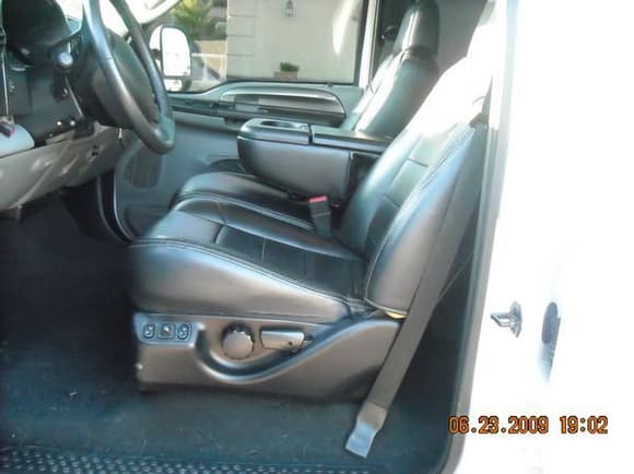 Leather Power Seats 40/20/40 with fold down center console (I don't have the leather wrapped steering wheel, PIC was taken in donor truck)