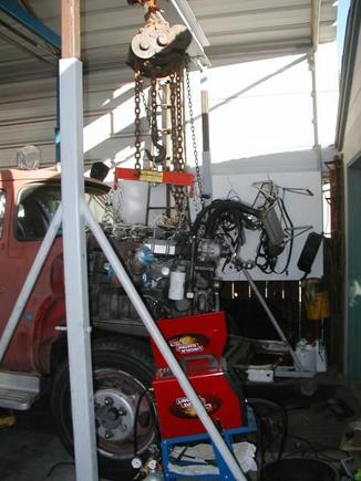 swinging the cummins in for a test fit before final welds on the front mount