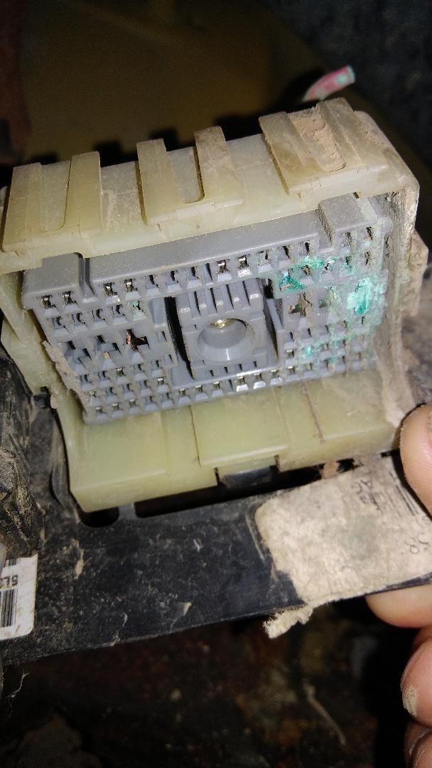 Identify this connector, mounted below parking brake Ford Truck