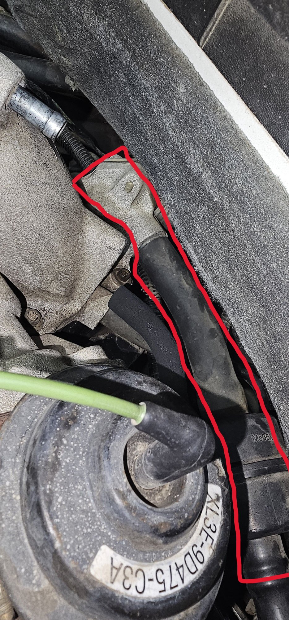 tube connected to the part on the back of the motor.