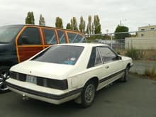 '81 Mercury Capri, I 6 (not our actual car)

It had a carburetor and my wife had trouble starting it. We replaced it with a '86 Chevrolet Cavalier wagon.
