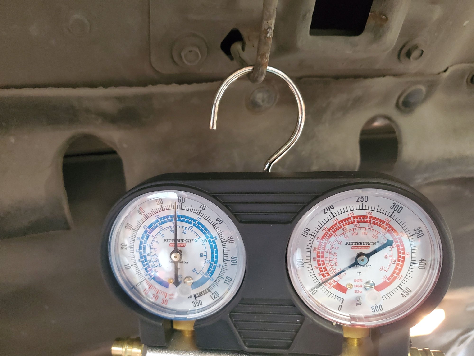 This picture is what it looks like when i shut the AC off, is it normal fir the low side to read like that?