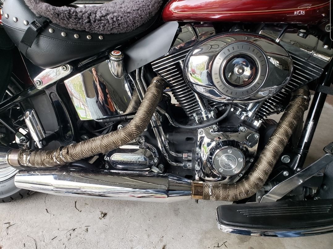 Exhaust wrap under the chrome heat shields Harley Davidson Forums