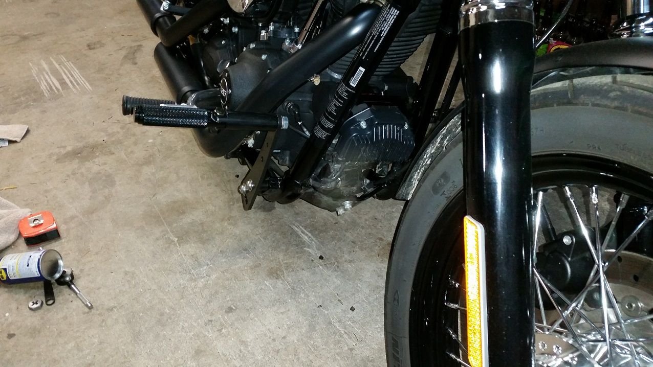 Black dyna lowrider s highway peg mounts Harley Davidson Forums