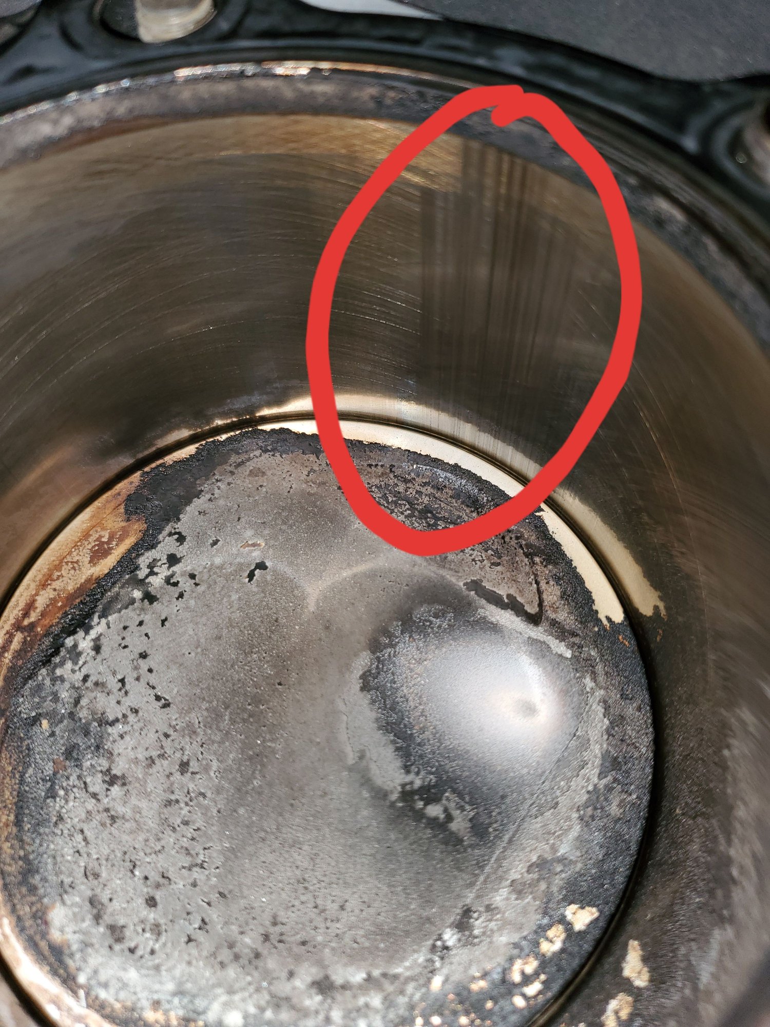 Cylinder scoring + gunk on guide Harley Davidson Forums