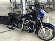My 2016 CVO Street Glide in Black licorice with cobalt blue flames. V&H with carbon tips. Harley tuner.