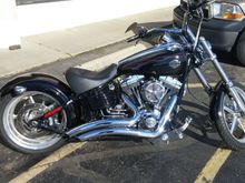 Love the bike....looking for rear fender/seat conversion ideas? Rocker /Breakout conversion maybe?