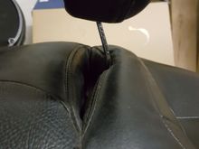 This is with the backrest in the slot.  It fits like my stock seat did